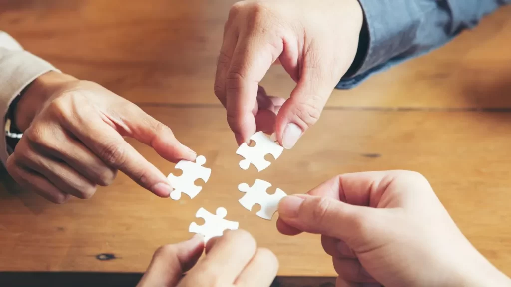 puzzle-pieces-shown-as-metaphor-to-Strengthening-Global-Collaboration